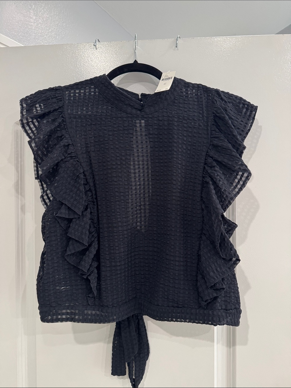 Ruffled Sleeveless Textured Black Top